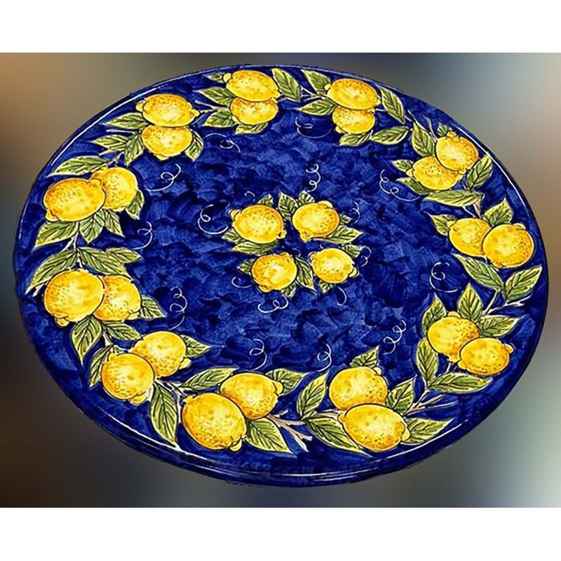 Table en pierre de lave céramisée. Citrons peints à la main sur bleu. Céramique Vietri